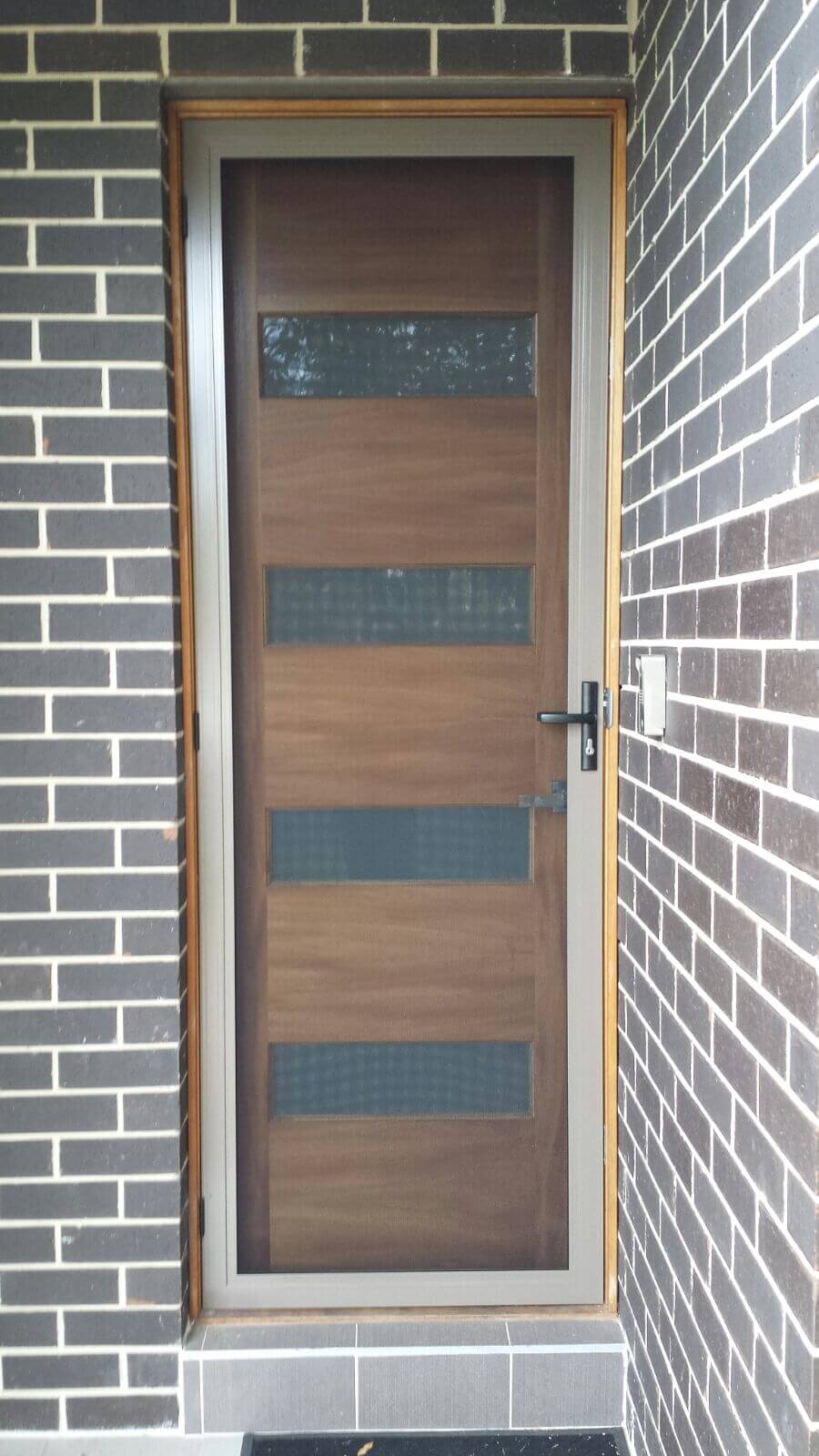 Aluminium frame security door with stainless steel mesh installed in Bentleigh