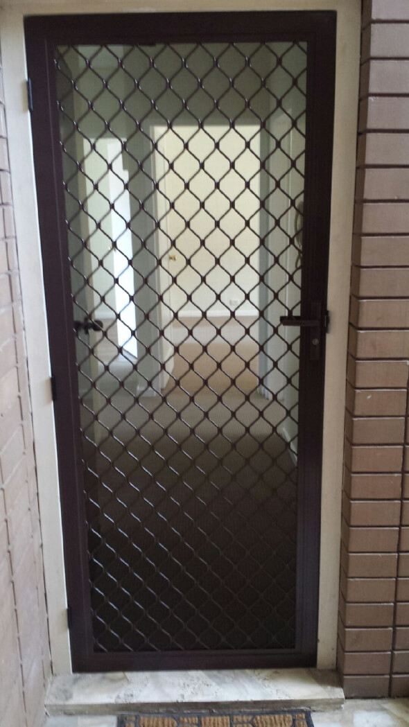Aluminum diamond design security door installed in dandenong