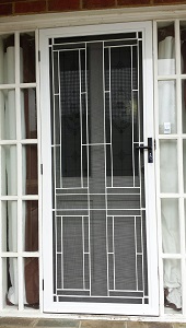 Aluminium door with grille in Clayton